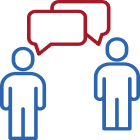 Blue outline icons of two people with red speech bubbles representing communication or conversation.