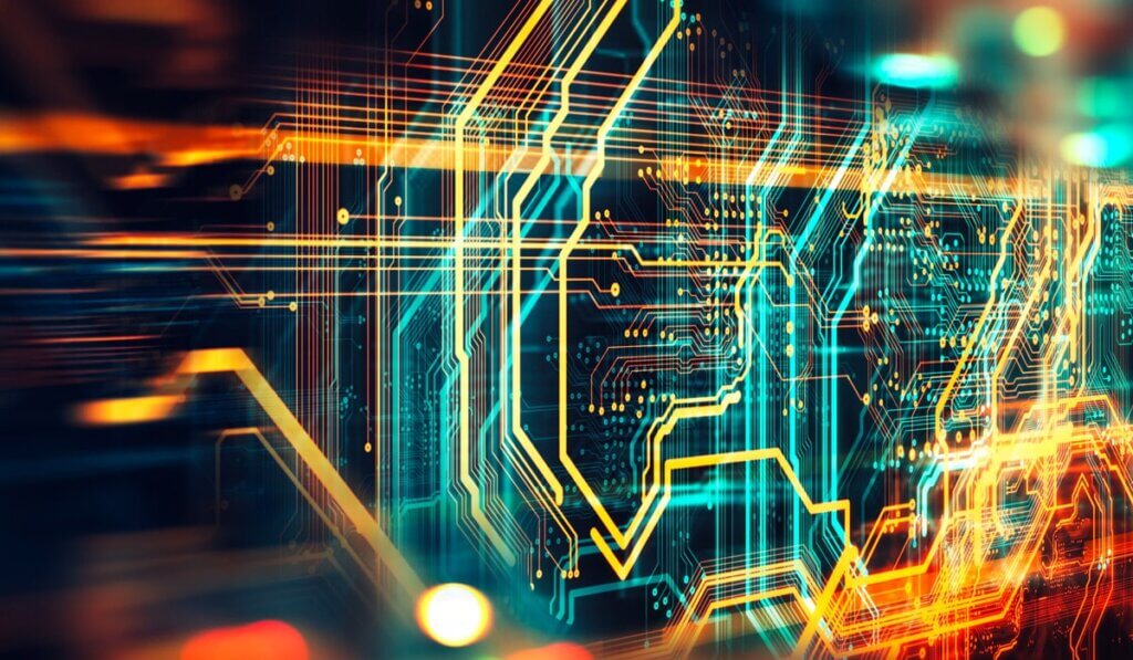 Glowing digital circuit board design with blue and yellow light pathways on dark background for technology leasing.
