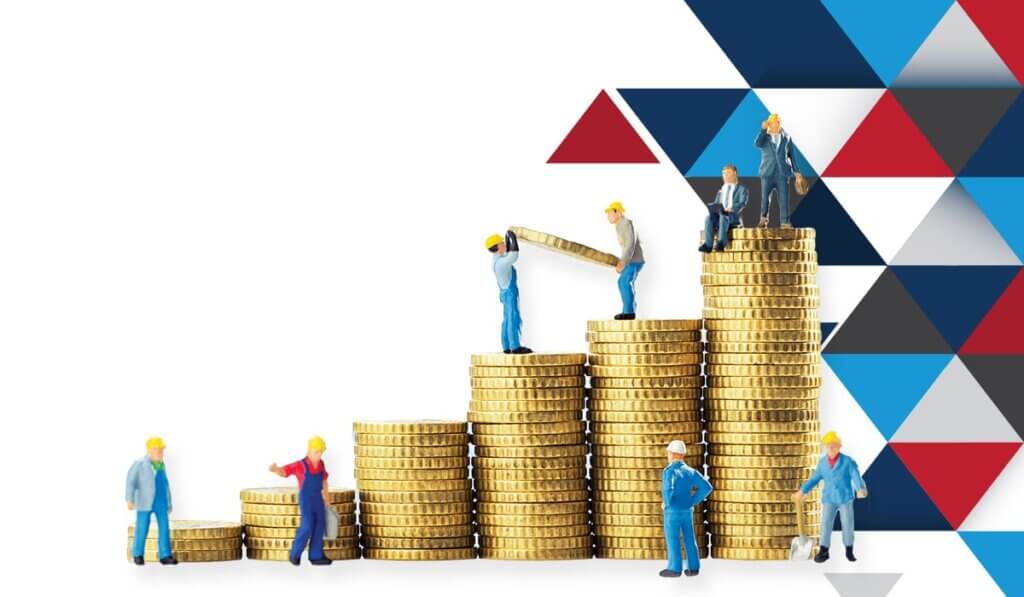 Small worker figurines on graduated stacks of gold coins symbolizing working capital management and growth.