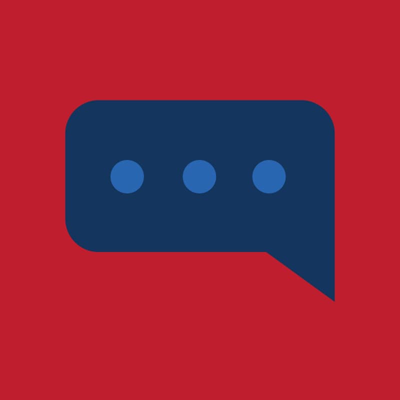 Dark blue speech bubble with three blue dots on red background representing messaging or typing activity indicator.